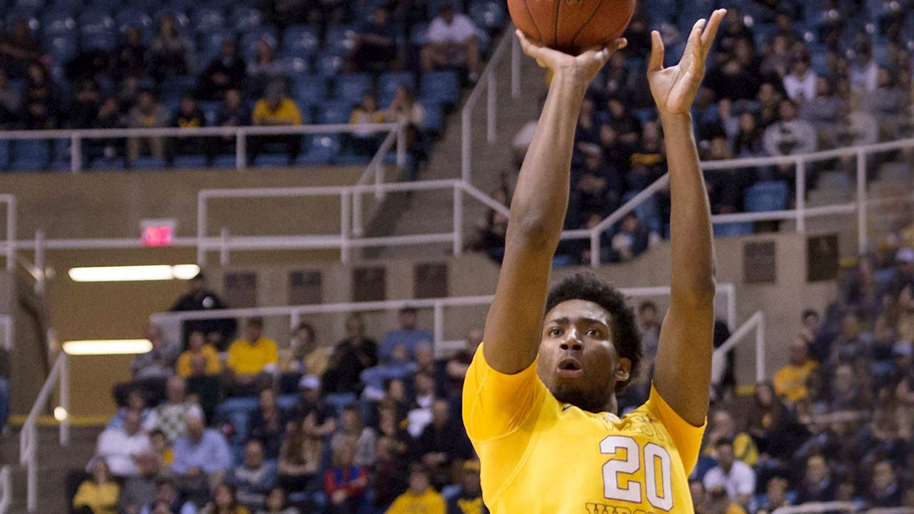 Watkins comes off bench to help No. 21 West Virginia top Kansas State